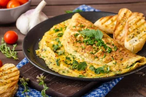 Once the eggs reach your preferred level of doneness, gently fold the omelette in half using the spatula. Transfer the omelette onto a plate and adorn it with toppings of your choice, such as shredded cheese, slices of avocado, or salsa. Serve the omelette while it's still hot and relish in the wholesome flavors of spinach and egg.